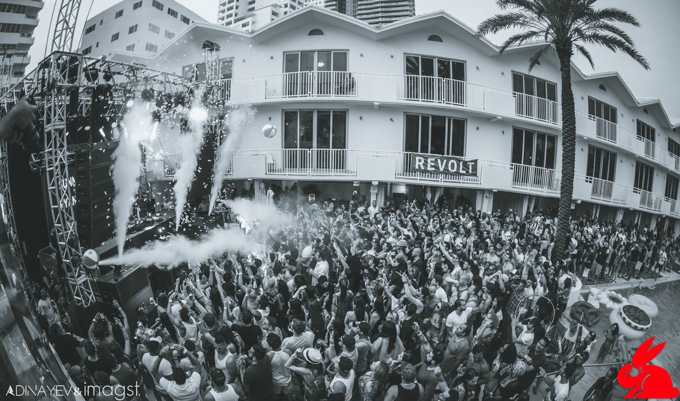 Confetti and CO2 over the REVOLT pool party, black and white