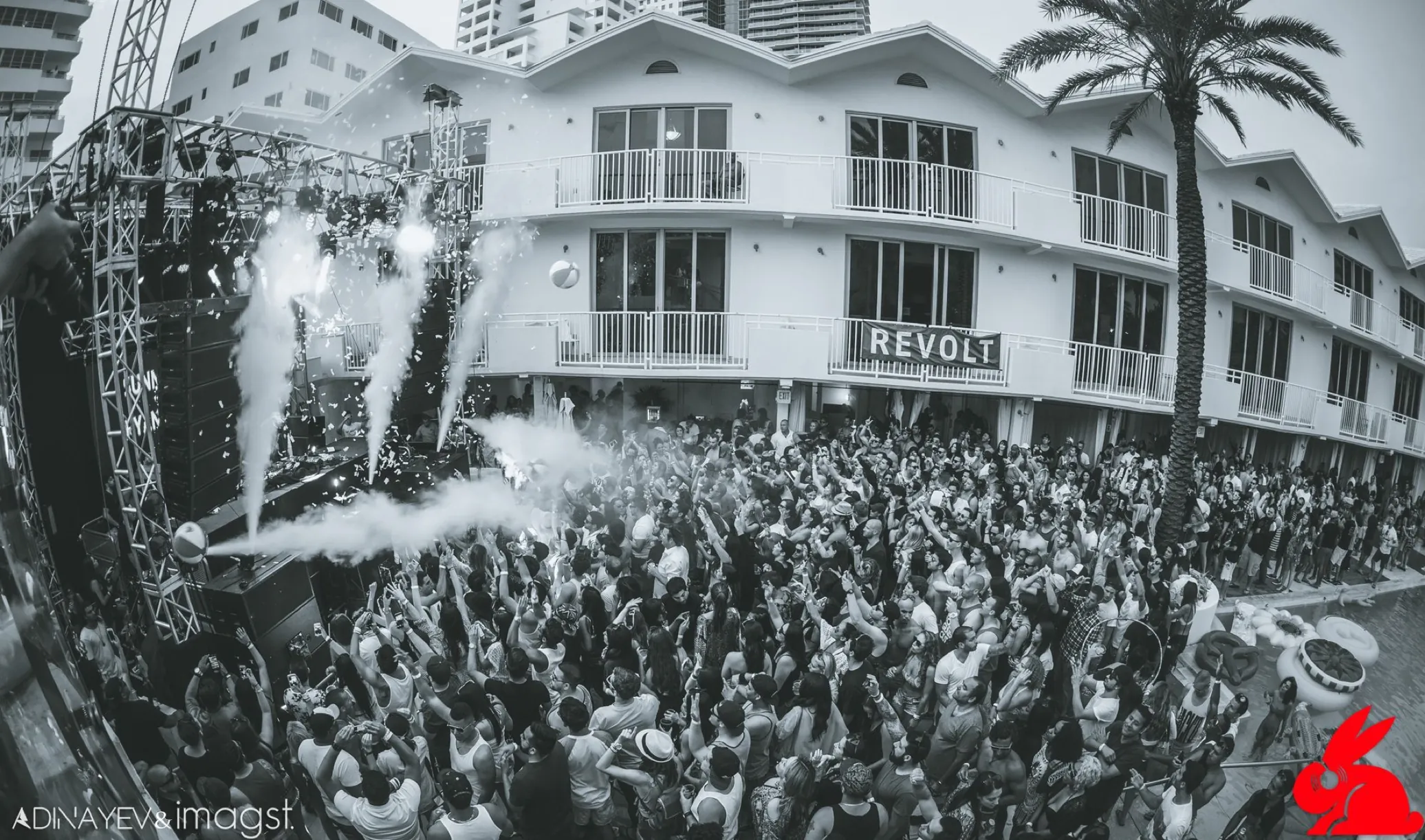 Confetti and CO2 over the REVOLT pool party, black and white